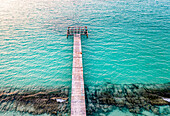 Aerial view of a broken jetty, inhabited island Vashafaru, Maldives, Haa Alif Atoll, Laccadive Sea.