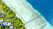 Aerial view of an abondoned jetty, crossing the reef of local island Omadhoo, Alif Dhaal Atoll, Maldives, Indian Ocean