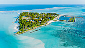 Panoramic aerial view of the local island Mathiveri with harbour, Alif Alif Atoll, Maldives.