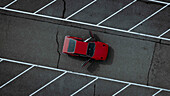 A top down aerial view of a Ferarri 308 GTI on a parking lot, Netherlands..