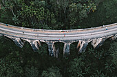 Aerial view of tourists walking on famous Nine arch bridge in Demodara, Ella, Sri Lanka.