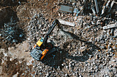 Aerial view of old building demolition work process in construction site in Kaunas city, Lithuania.