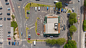 Aerial view of a bustling mcdonald's restaurant with a parking lot and cars, Bridgwater, England.