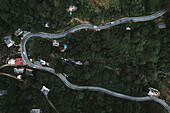 Aerial top down view of winding mountain road near Ella, Sri Lanka.