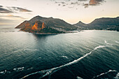 Aerial view of Hout Bay over the Atlantic Ocean from the lookout point on Chapmans Peak Drive, Cape Town, South Africa.