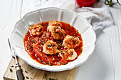 Monkfish cheeks in tomato ragout
