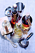 Various bar syrups and bar utensils
