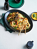 Japan-style spaghetti with sake, Asian mushrooms and soy sauce