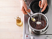 Glossy cake icing - melt chocolate with cooking oil