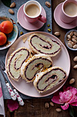 Cake roulade with pistachio cream and jam
