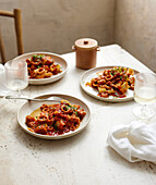 Squid ragout with calamarata pasta