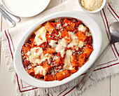 Baked rigatoni with bolognese and béchamel sauce from the oven