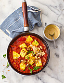 Mediterranean shakshuka with tofu and tahini