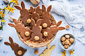 Easter bunny biscuits with almond balls in an Easter basket