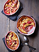 Baked strawberry pudding in individual molds