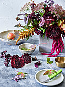 Autumnal bouquet with dahlias, amaranth and decorative egg