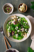 Wild herb salad with pears, feta and herb oil