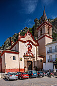 Zahara, Spain, Apr 10 2020, Visitors admire the 18th-century Church of Santa Maria de la Mesa in Zahara de la Sierra, surrounded by stunning Andalusian scenery.