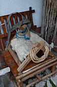 A wooden pack saddle at the Tahuantinsuyo Weaving Workshop, Otavalo, Ecuador.