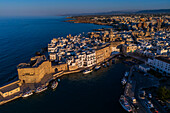 Aerial view of Porto Antico, the historic old port, the Marina, Castello Carlo V and the old town, Monopoli, Italy