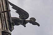 A stylized condor gargoyle on the Basilica del Voto Nacional in Quito, Ecuador.