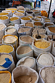 Bulk dry foods for sale in the open market in Otavalo, Ecuador.