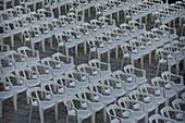 Empty white chairs before a show in San Lorenzo de El Escorial, Community of Madrid.