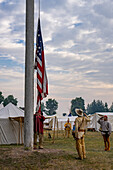 Men in period dress at the flag-raising ceremony at the Fort Bridger Rendezvous in Wyoming.