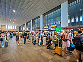 Seville, Spain, May 21 2025, Travelers wait in long lines at Santa Justa Railroad Station in Seville, preparing for their journeys on this busy day in Andalusia.