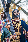 Nuestro Padre Jesus de la Victoria, a revered statue, is featured prominently during a Holy Week procession in Seville, Andalusia.