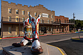 Decorated cowboy boot sculpture in front of the West of the Pecos Museum in Pecos, Texas.