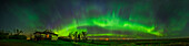 This is a roughly 180º panorama of the bright aurora, which had peaked at a Kp 6 to 7 level, on the night of May 28/29, 2025, shot from home in southern Alberta. The aurora was starting a post-substorm pulsing or flickering phase at this time. The arc displays some blue pillars and upper curtains from sunlight interacting with the aurora particles.