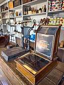 Antique account register & scale in Carter's commissary store from the 1800s at the Fort Bridger Historic Site in Wyoming.
