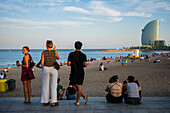 Barceloneta beach promenade with the W Hotel in the background, Barcelona, Spain