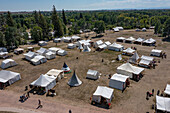 Aerial view of the Fort Bridger Rendezvous at the Fort Bridger Historic Site in Wyoming, a reenactment of the mountain man era. Prior permission granted for drone photography at site.