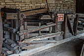 An antique wooden hay baler from about 1900 on display at the Fort Bridger Historic Site in Wyoming.