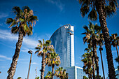 Barceloneta beach promenade with the W Hotel in the background, Barcelona, Spain