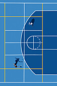 Aerial view of two figures playing on a blue court with white lines, a minimalist tableau of sport and solitude, Split, Split-Dalmatia County, Croatia.