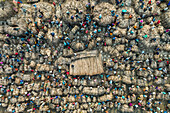 Aerial view of bustling raw jute market with crowd of people engaged in trade, Chinadulli, Islampur, Mymensingh, Bangladesh.