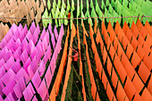 Araihazar, Bangladesh - 04 December 2020: Aerial view of vibrant fabrics dyeing workshop with colorful patterns and workers, Duptara, Araihazar, Dhaka, Bangladesh.
