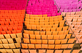 Araihazar, Bangladesh - 04 December 2020: Aerial view of vibrant fabric dyeing process with colorful cloth rows and patterns, Duptara, Araihazar, Dhaka, Bangladesh.
