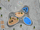 Aerial view of colorful kids playground with modern design and playful patterns, Biesdorf, Berlin, Deutschland.