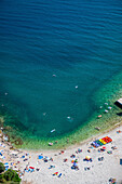 Aerial view of beautiful hawaii beach with turquoise water and sandy shoreline, Pula, Istria, Croatia.