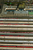 Aerial view of busy trains depot with rail lines and urban infrastructure, Tafelhof, Nurnberg, Bayern, Germany.