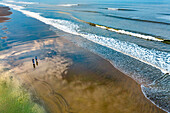 Aerial view of Kolatoli Beach with serene waves and tranquil shoreline, Cox's Bazar, Chattogram, Bangladesh.