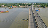 Aerial view of Shah Amanat Bridge over the Karnafully River with ships, Sikalbaha, Patiya, Bangladesh.