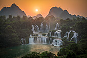 Aerial view of Ban Gioc Detian Falls along the Quay Son River on the Karst hills of Daxin County, Guangxi, China.