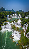 Aerial view of Ban Gioc Detian Falls along the Quay Son River on the Karst hills of Daxin County, Guangxi, China.