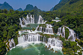 Aerial view of Ban Gioc Detian Falls along the Quay Son River on the Karst hills of Daxin County, Guangxi, China.