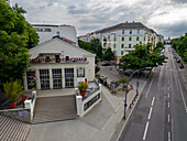 Berlin, Germany - 30 May 2025: Aerial view of the stately Volksbühne theatre, a beacon of culture amid the urban tapestry, framed by verdant trees and quiet streets..